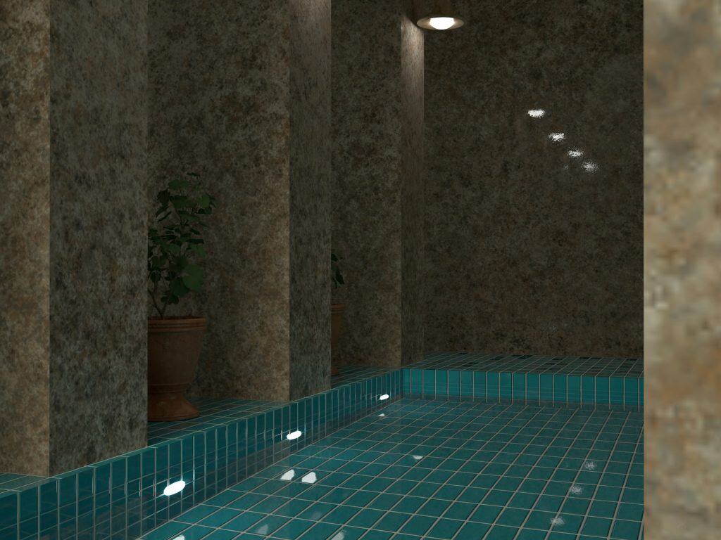 High-resolution image of an indoor spa or pool area featuring textured stone walls, elegant tiled flooring, and ambient lighting, perfect for a custom backyard retreat.
