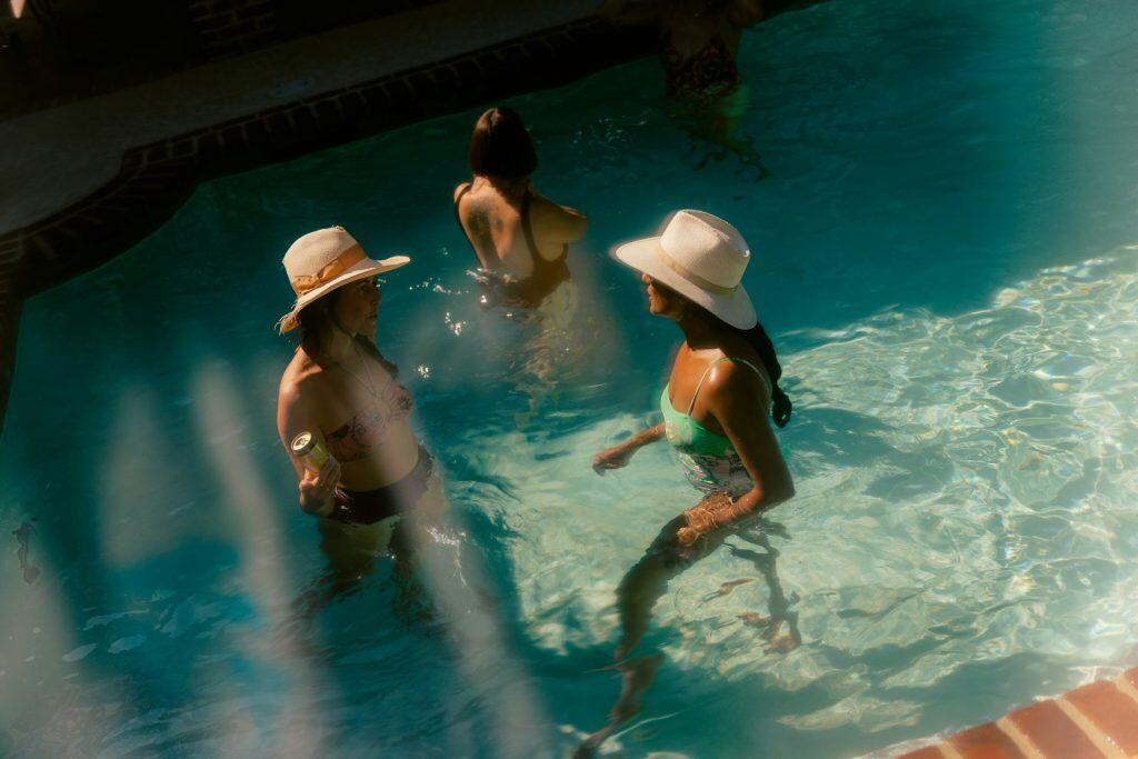 Comfortable, stylish pool surrounded by a brick edge perfect for relaxing and swimming.